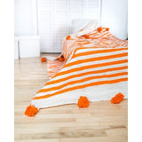 White Pompom Blanket with orange stripes