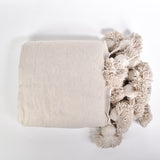 Khaki Moroccan Blanket with khaki pompoms