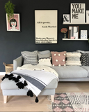 White with Black Pom Pom and one Big Black stripe at end Blanket