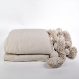 Khaki Moroccan Blanket with khaki pompoms