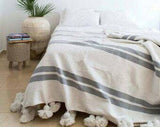 White Moroccan Blanket with gray stripes and White Pompoms